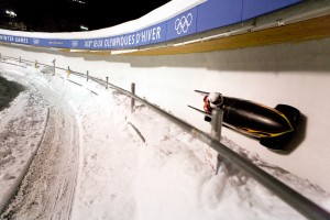 mweinberg_teamholm-0887 Bobsled speeding around a bend in the track